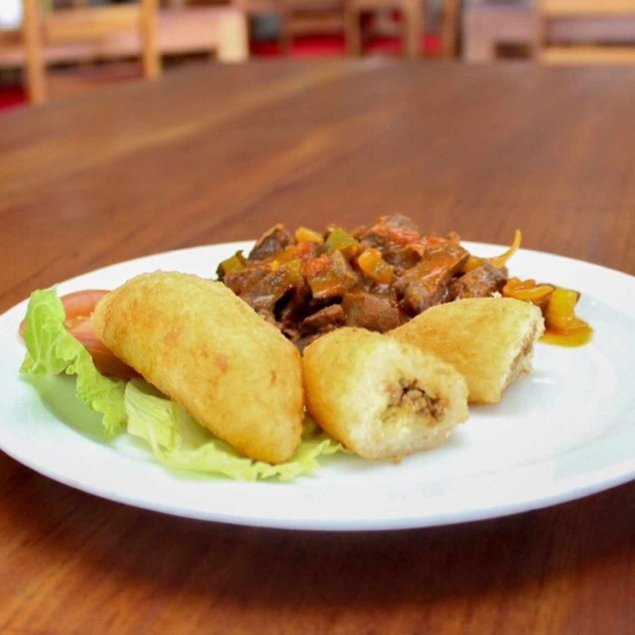 Carimañola con Bistec encebollado