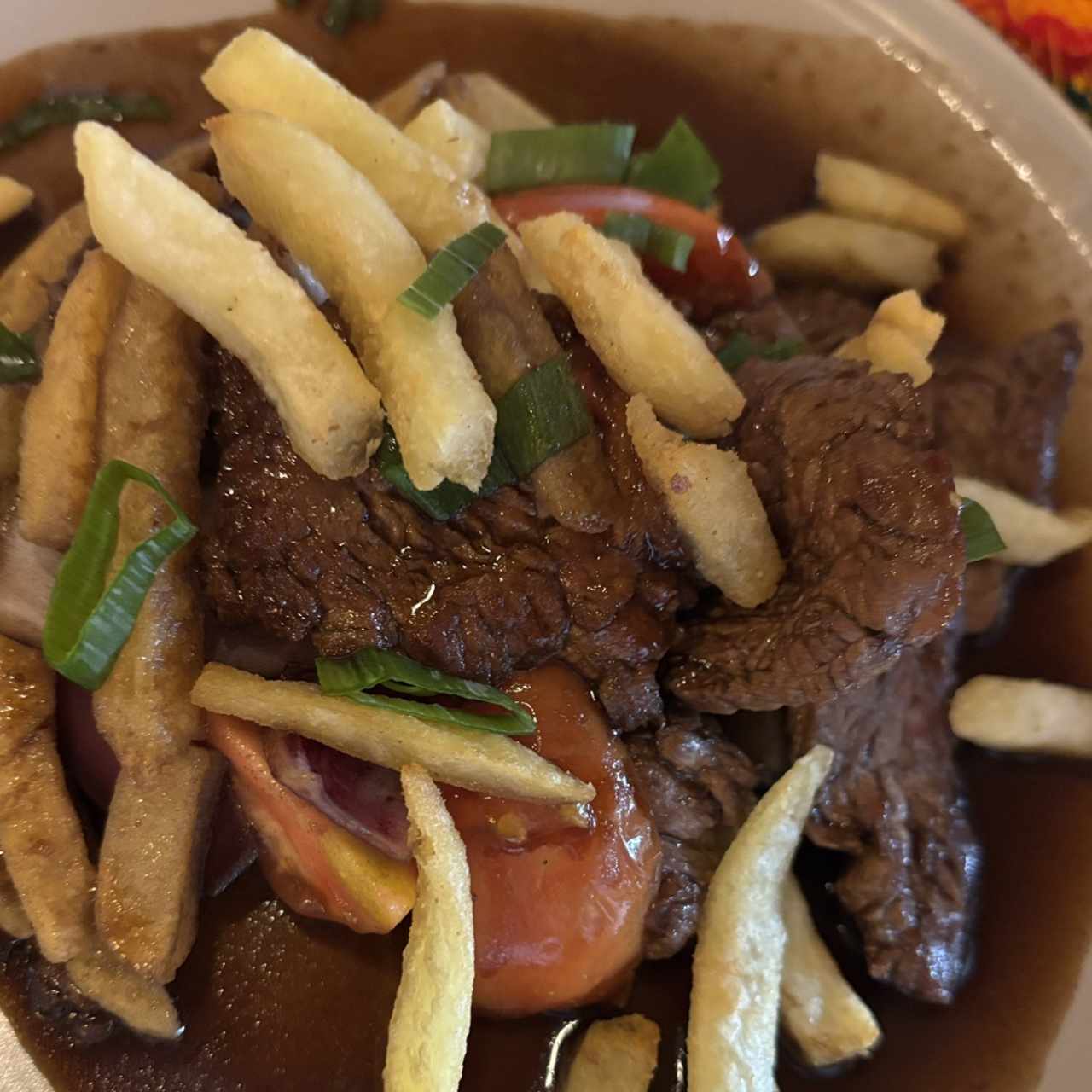 Lomito Salteado - Sauteed Steak with French fries and rice