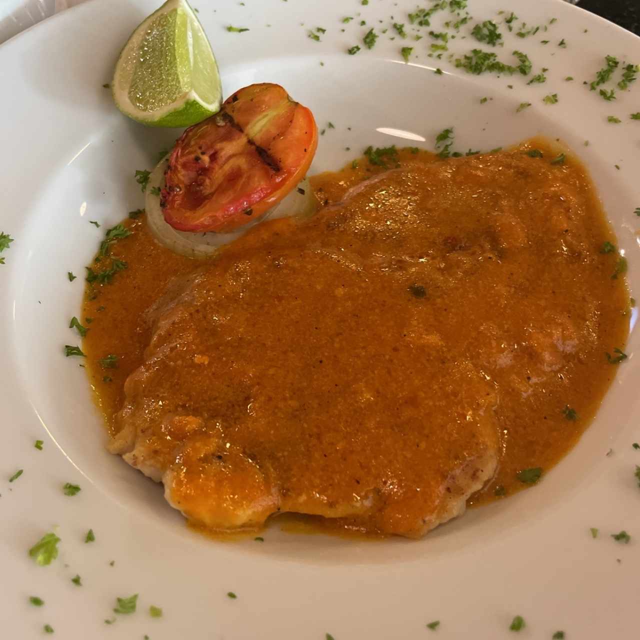 Filete de corvina al ajillo