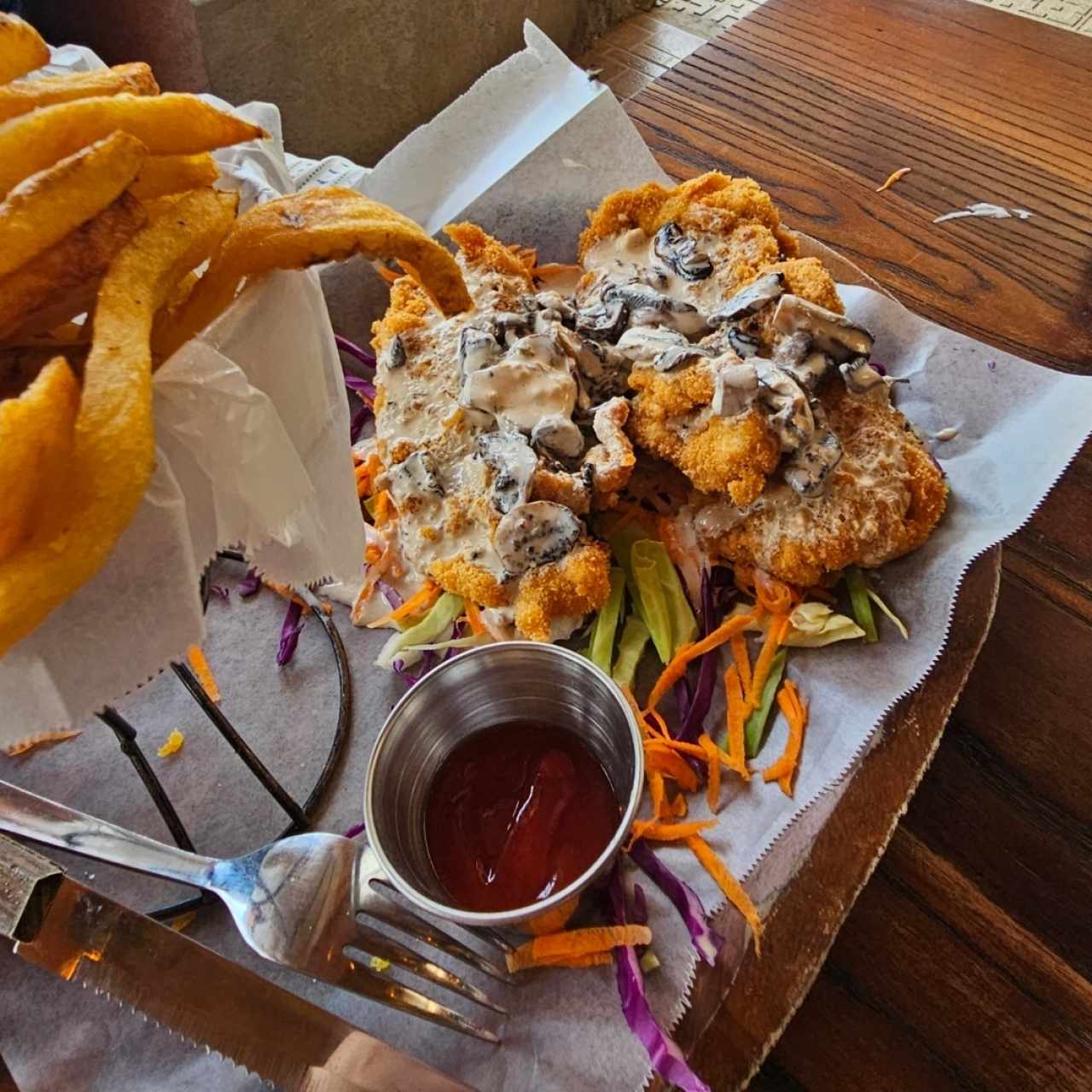 schnitzel con crema de hongos