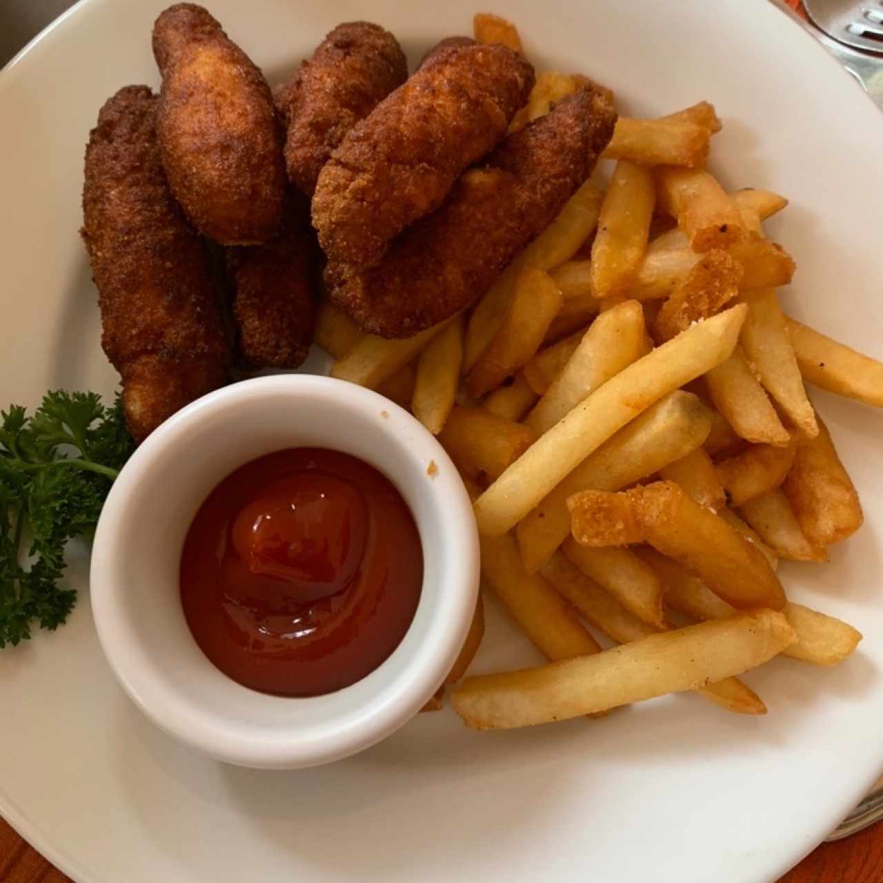 Chicken or fish nuggets with fries