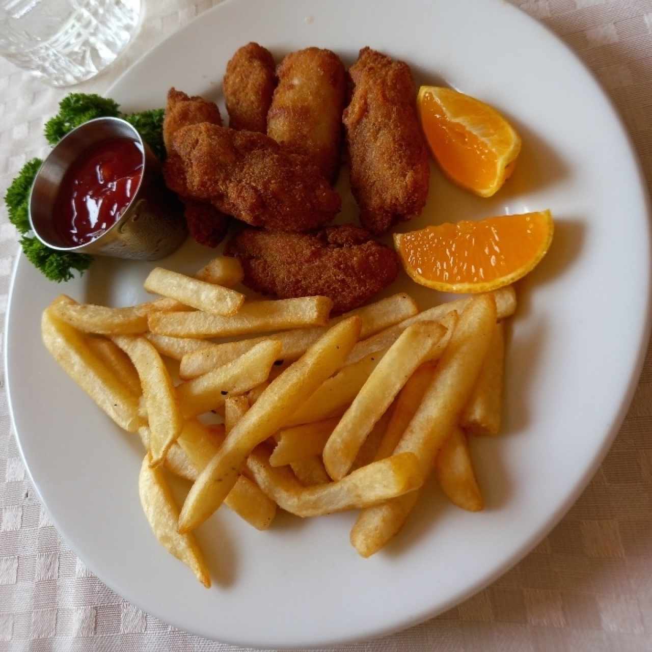 Chicken or fish nuggets with fries