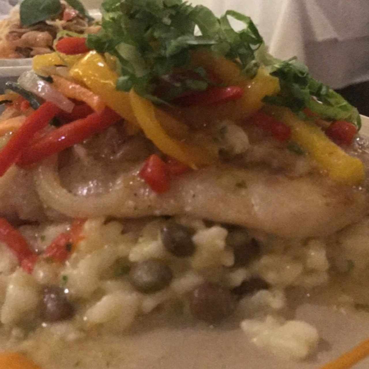 corvina al ajillo con risotto de guandú