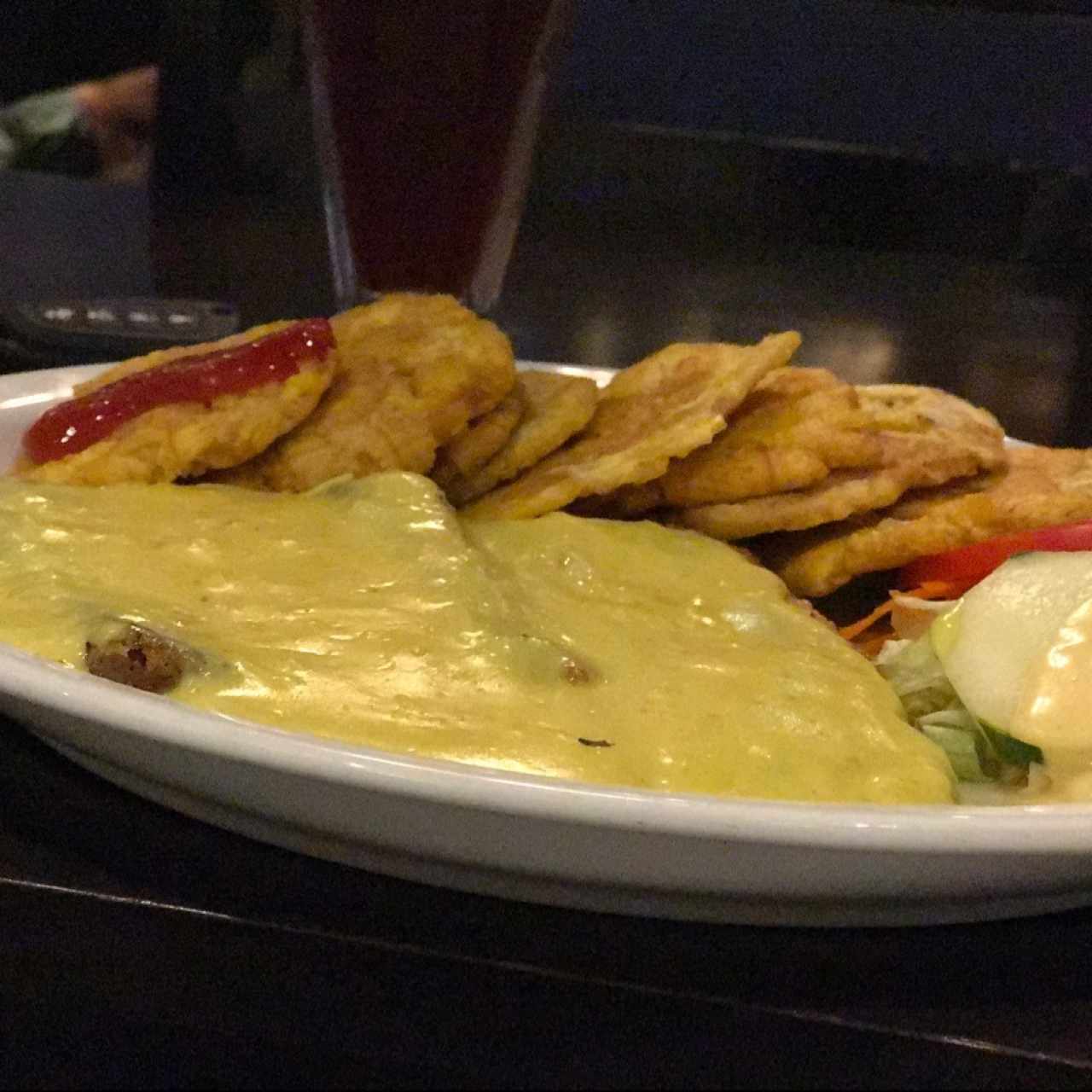 Filete de pescado en salsa de coco y curry