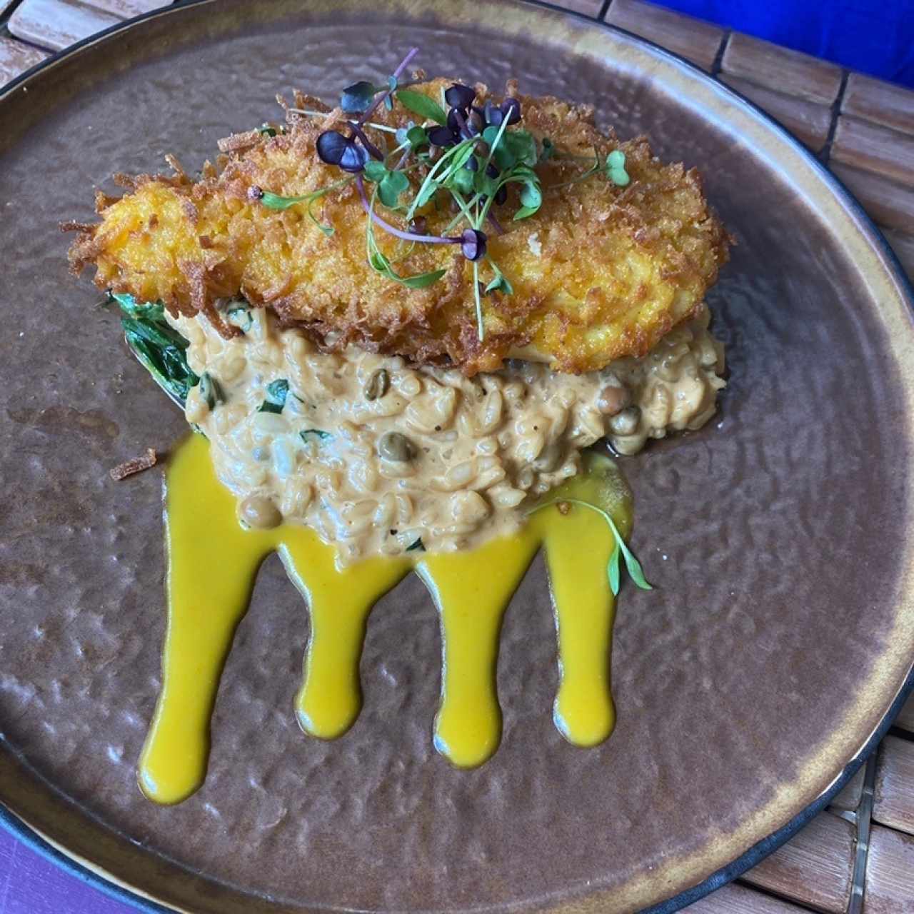 Pollo al coco con risotto de wandu. 