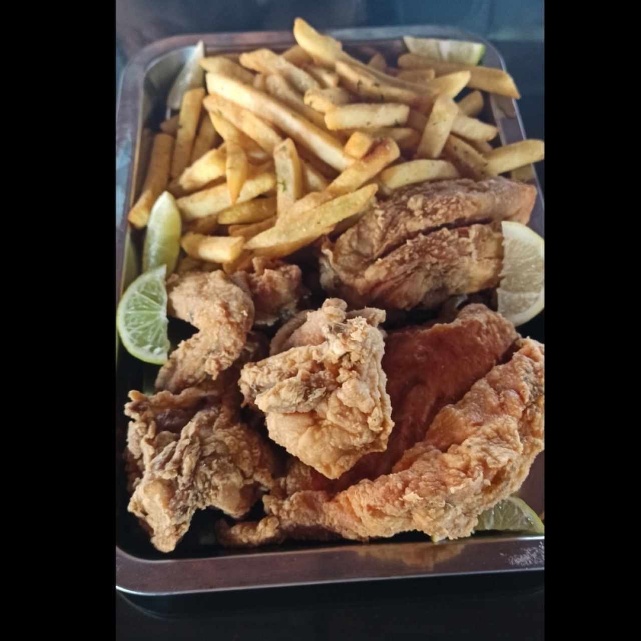 Medio pollo con papas