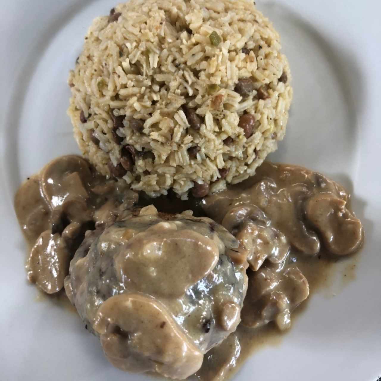 filete mignon con arroz con guandú y coco