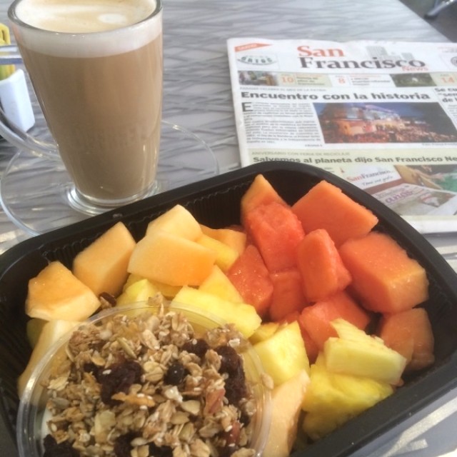 Granola with yogurt and fruit and a cafe con leche at Jeffreys