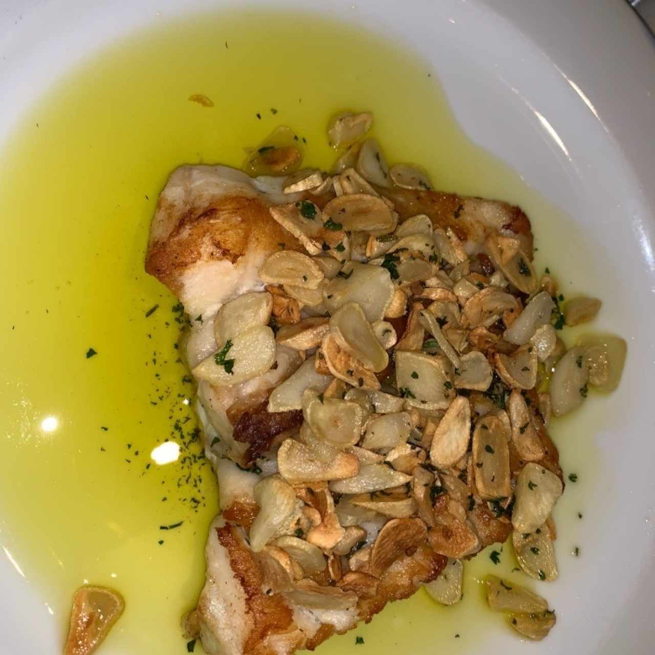 Corvina al ajo