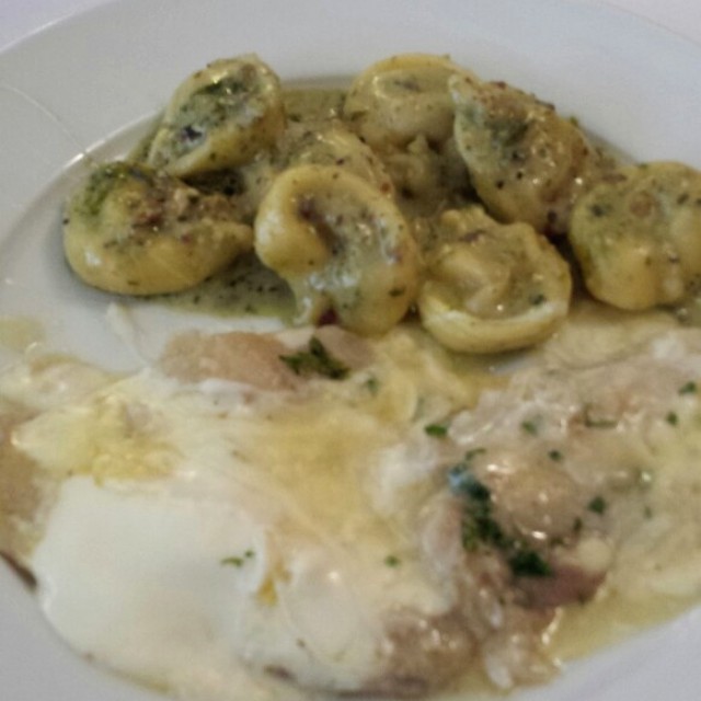 Lenguado a la Parmigiano and Cheese tortellini in green sauce.