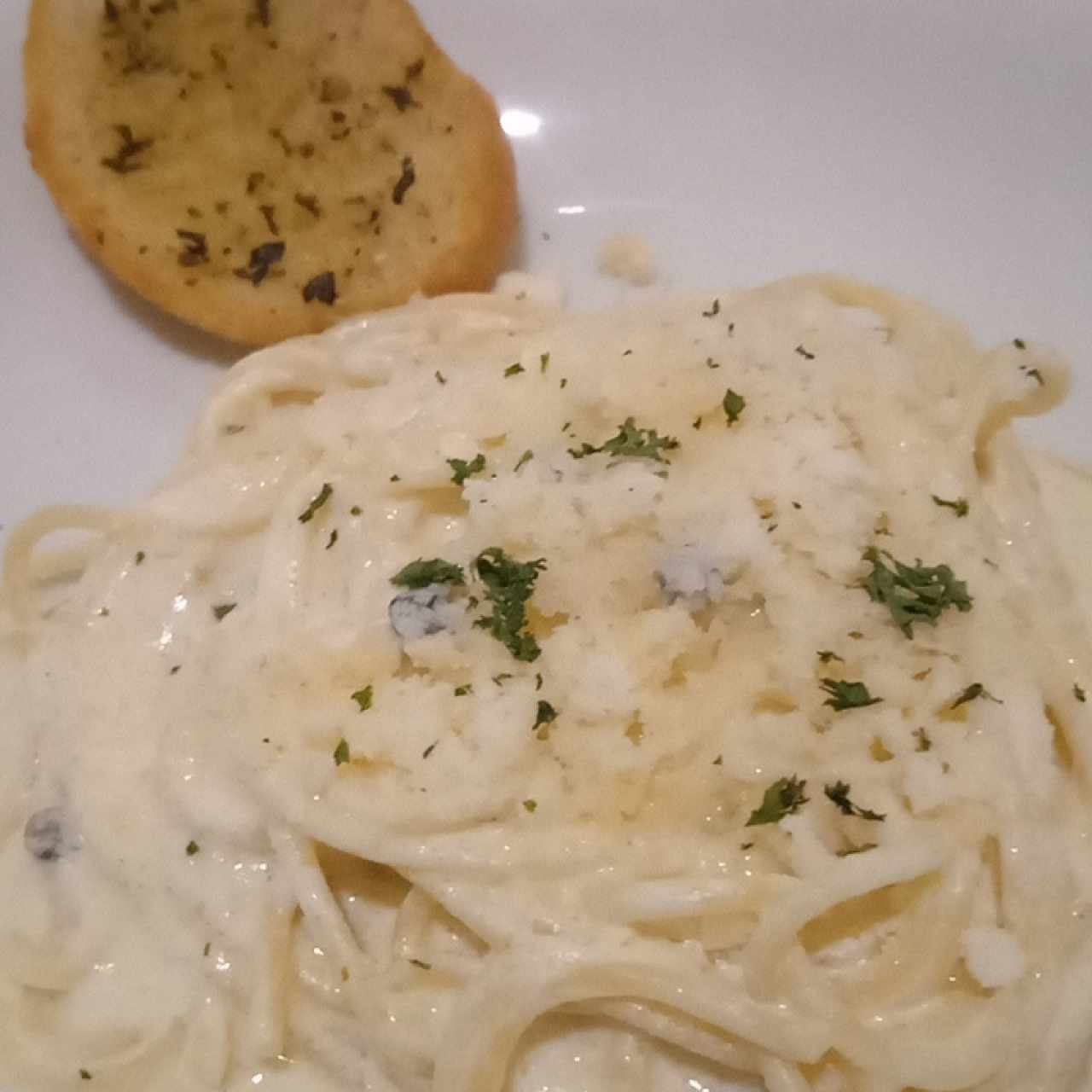 Spaguettini al limón y pimienta verde