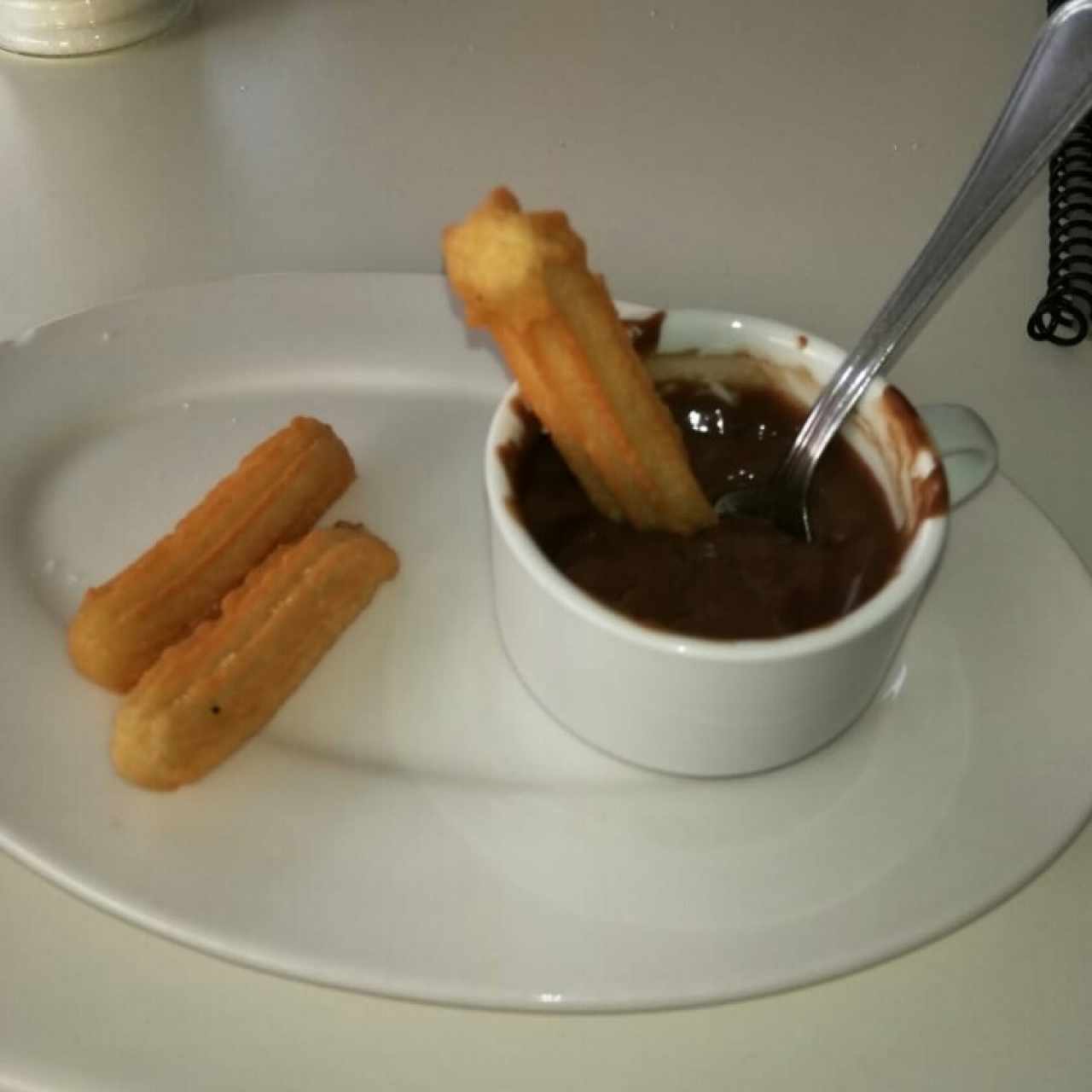 churros con chocolate caliente 