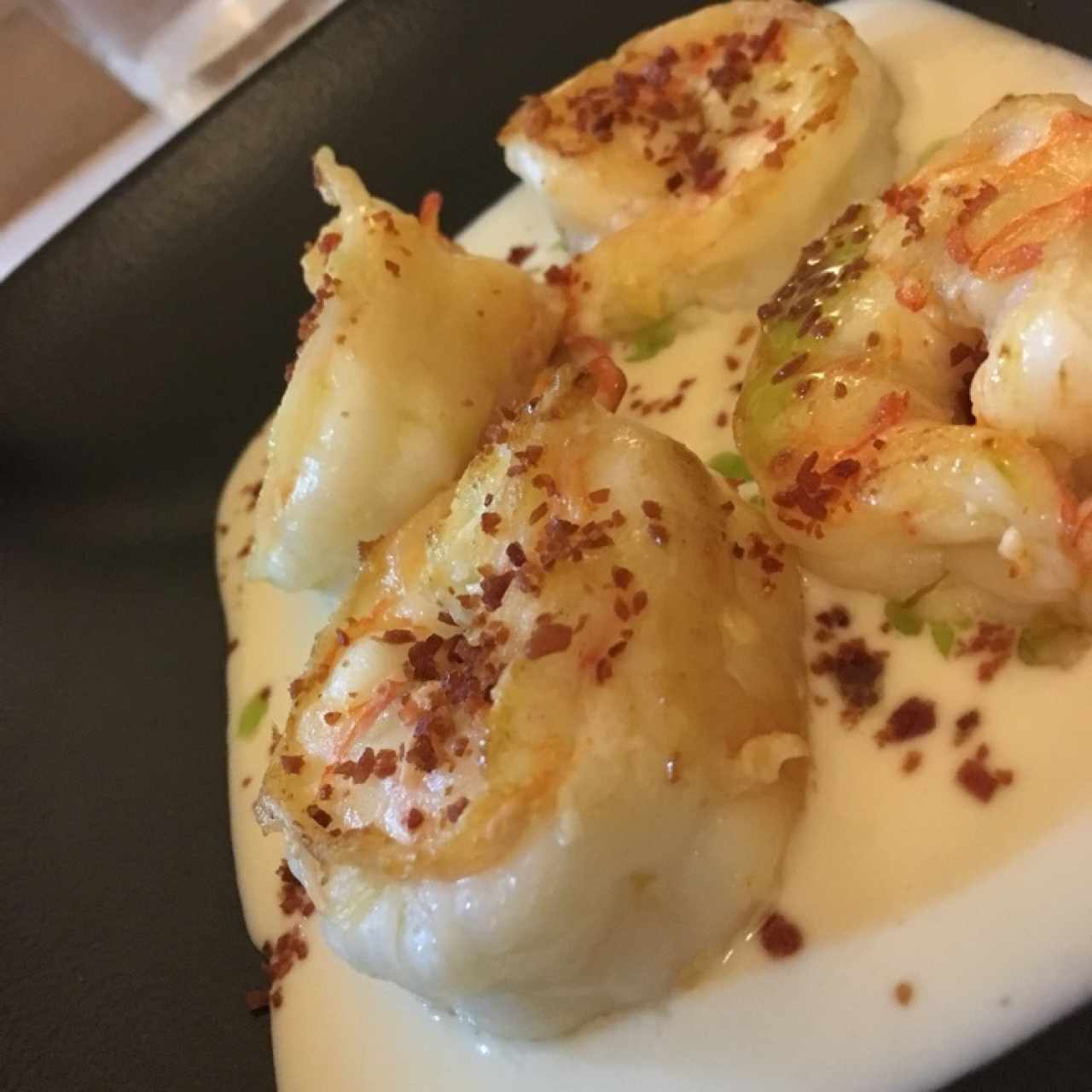 langostinos en salsa de manchego