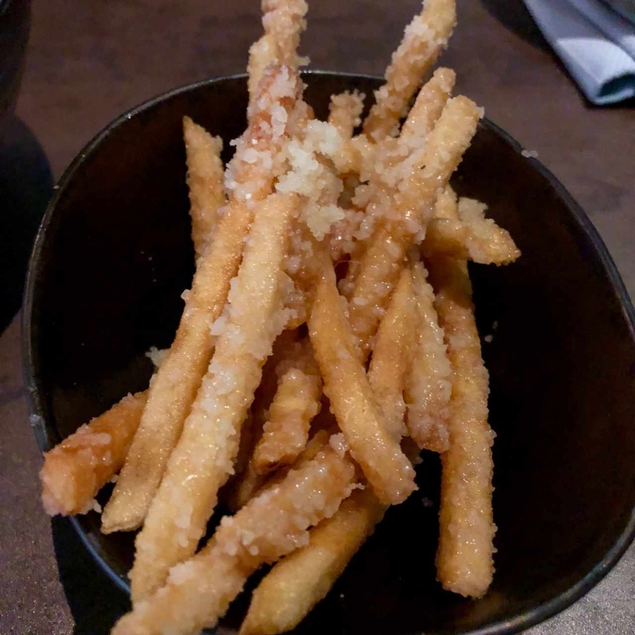 Papas francesas con perfume de trufas y Granna Padano