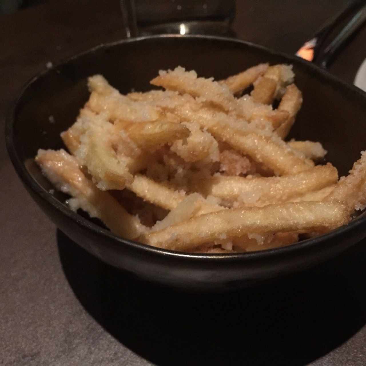 Papas francesas con perfume de trufas y Granna Padano