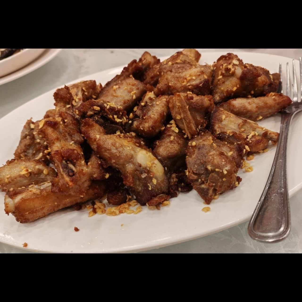 Puercos - Costilla frita sal y pimienta 