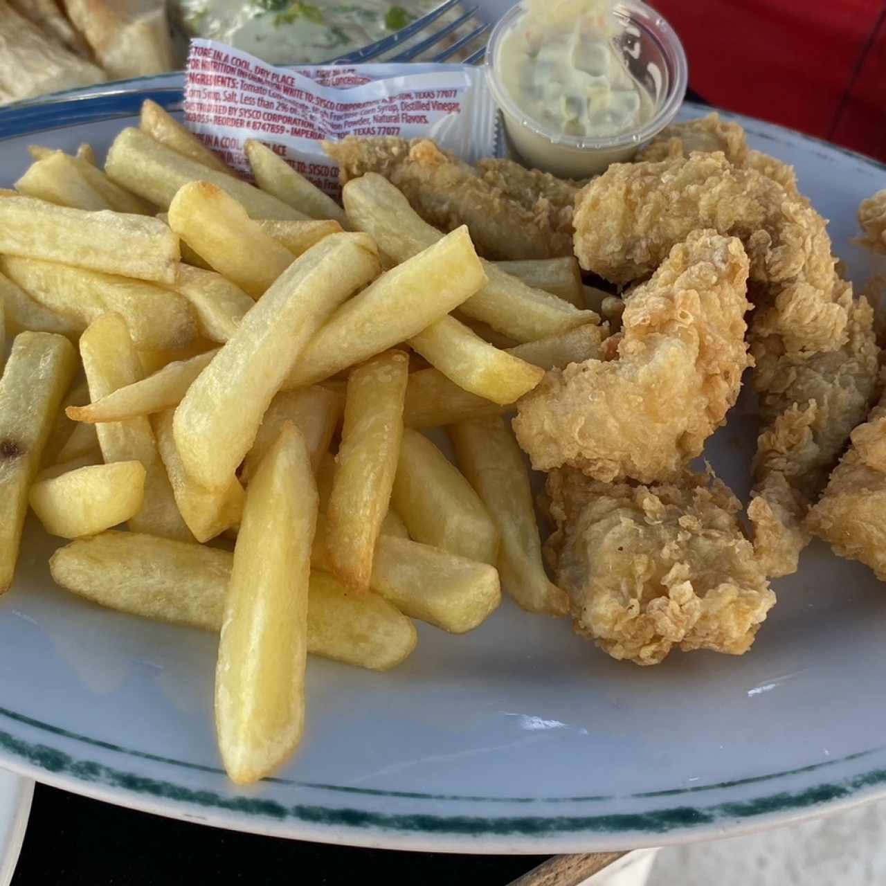 Deditos de corvina apanadoa con papa frita