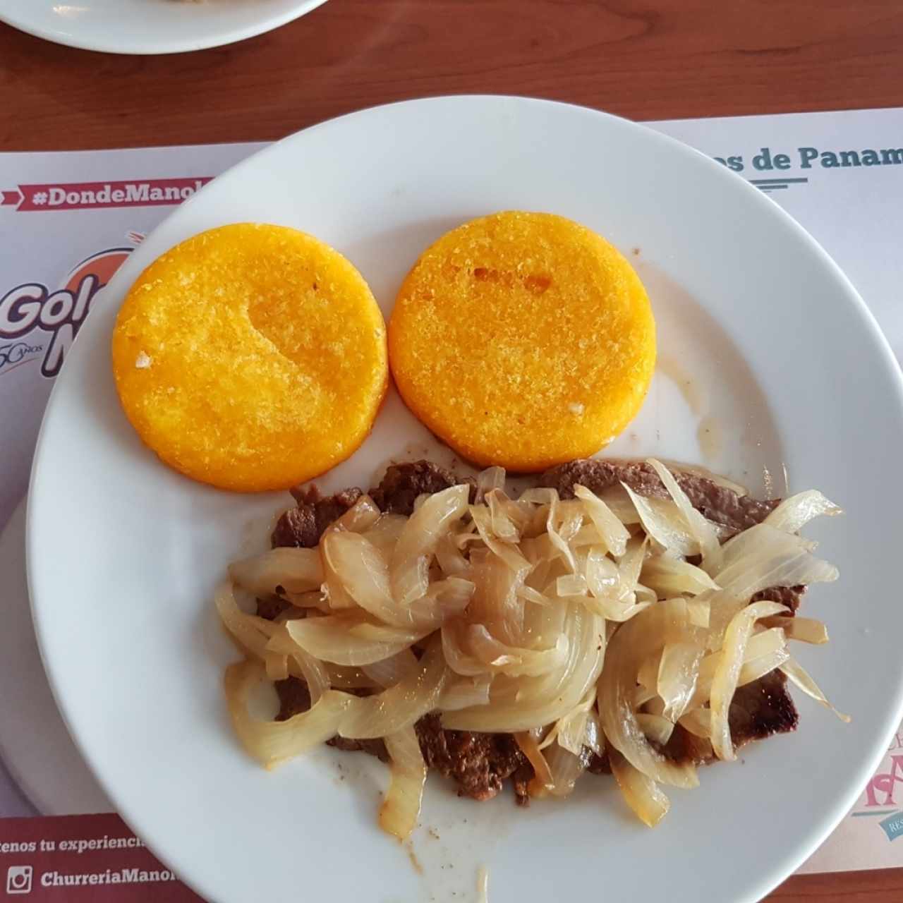 Bistec encebollado