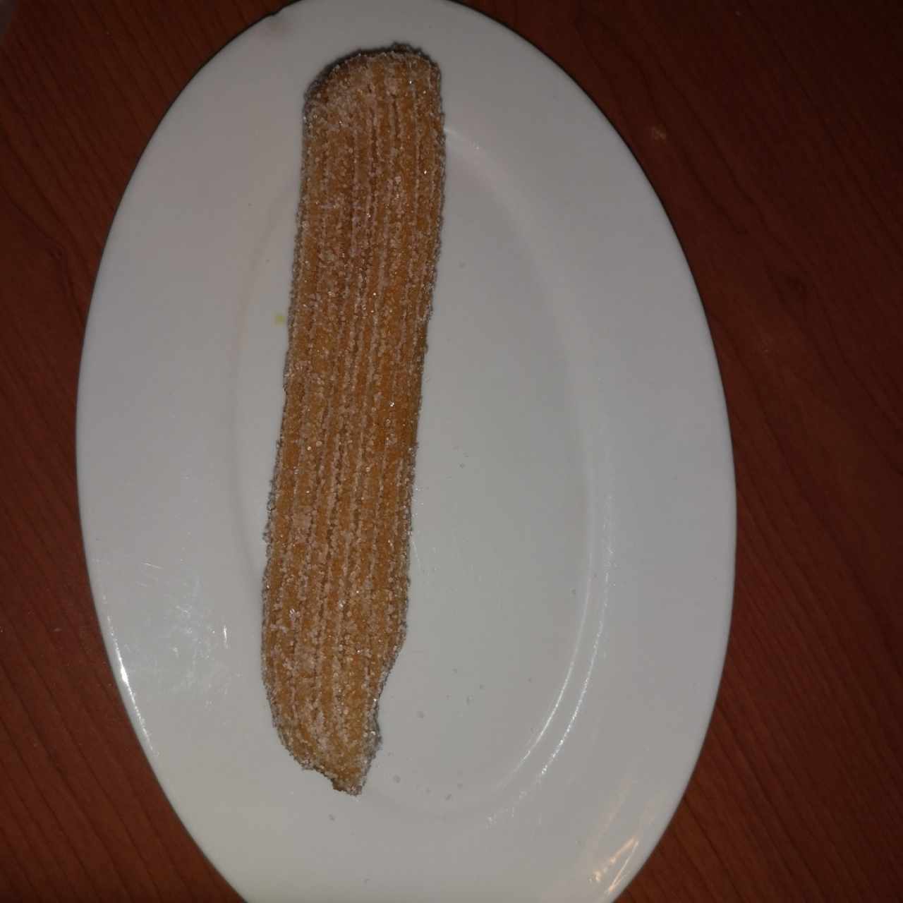 Churro relleno de manjar blanco