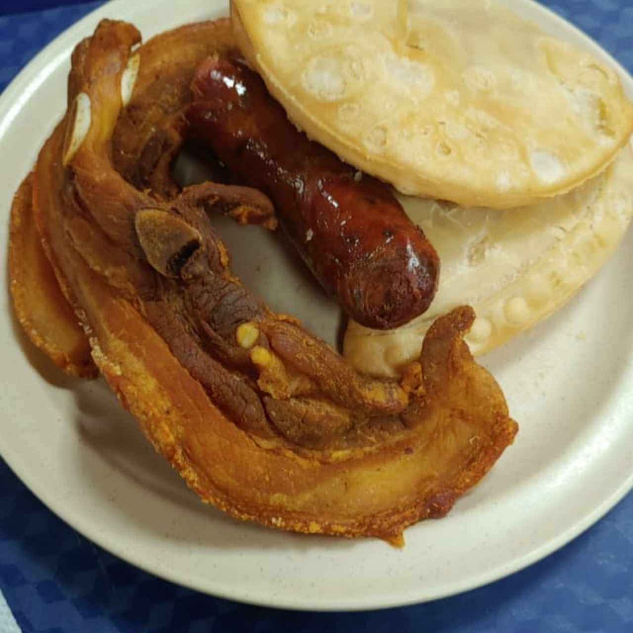 costilla, chorizo y empanadas