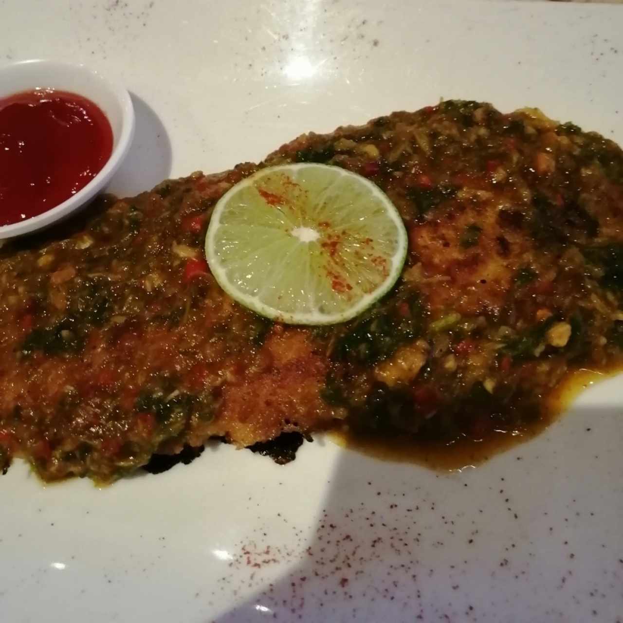 Filete de Corvina al ajillo