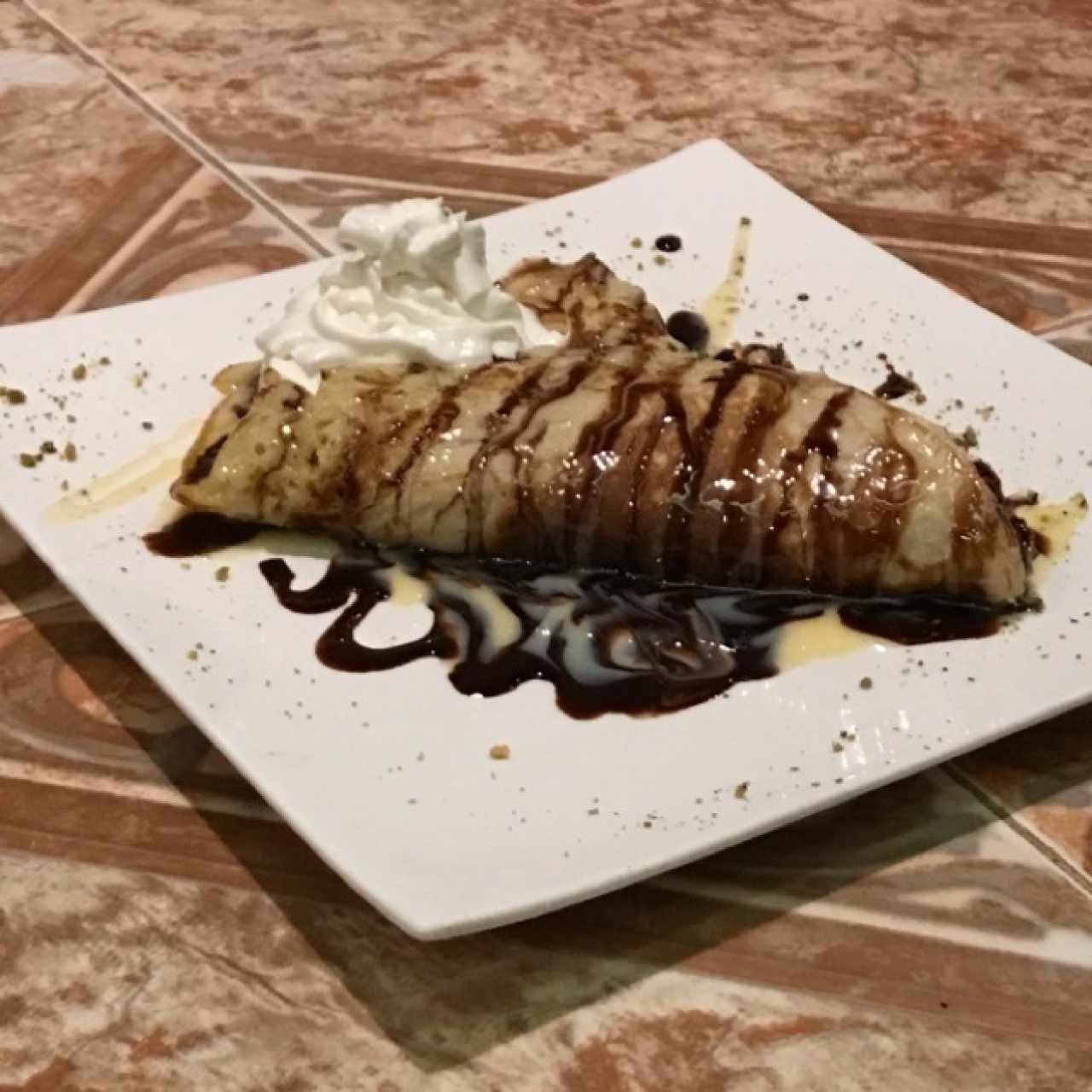 "crepe" con chocolate. Era más un pancake que crepe