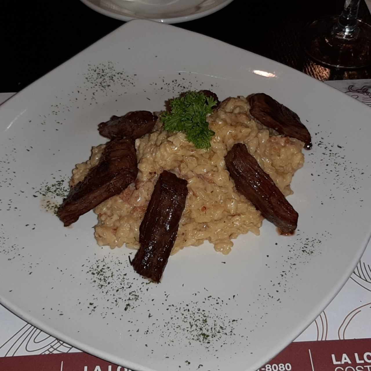 Risotto con cortes de entraña