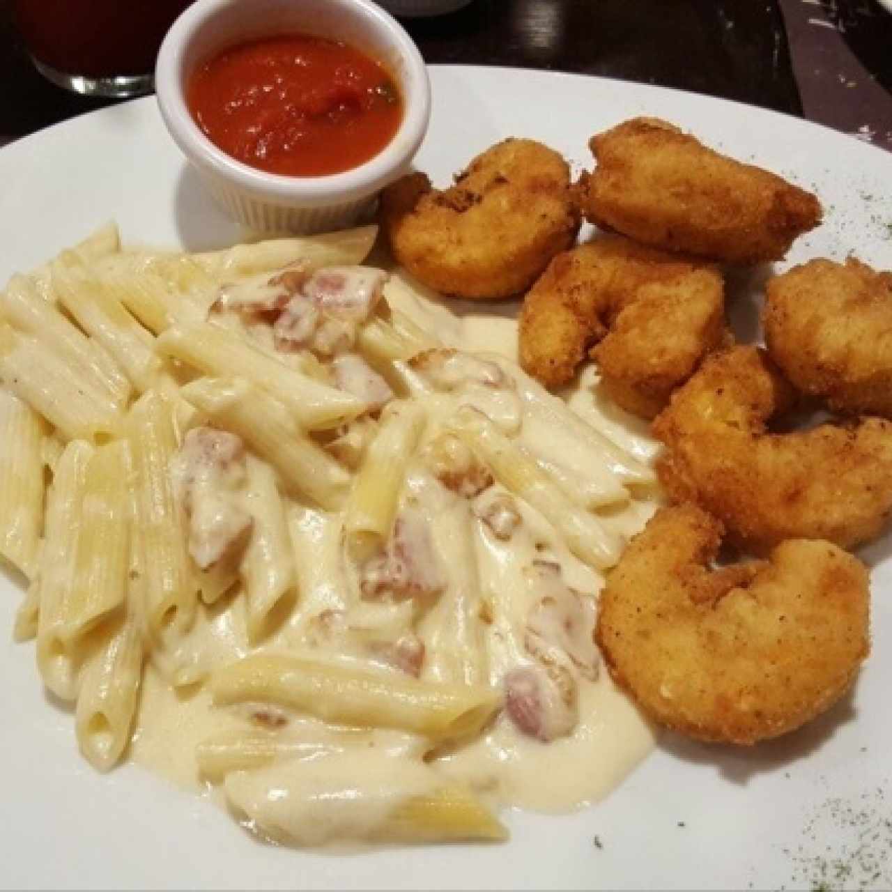 Langostinos Apanados con pasta a la carbonara...