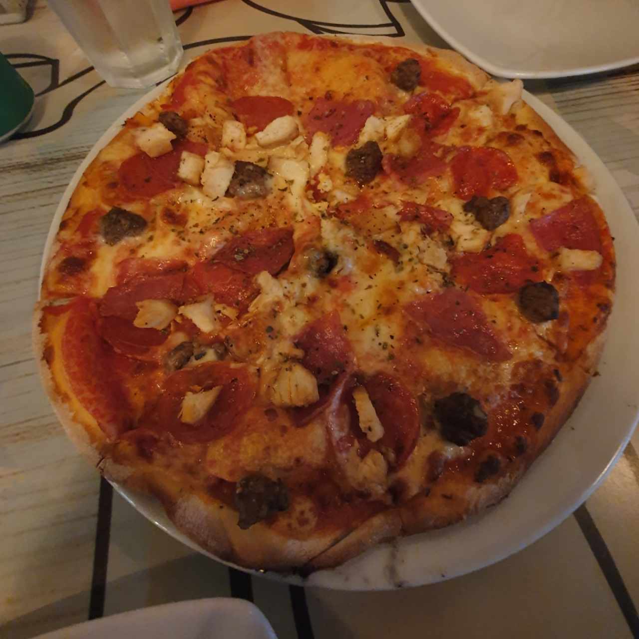 pizza al forno con extra de pollo