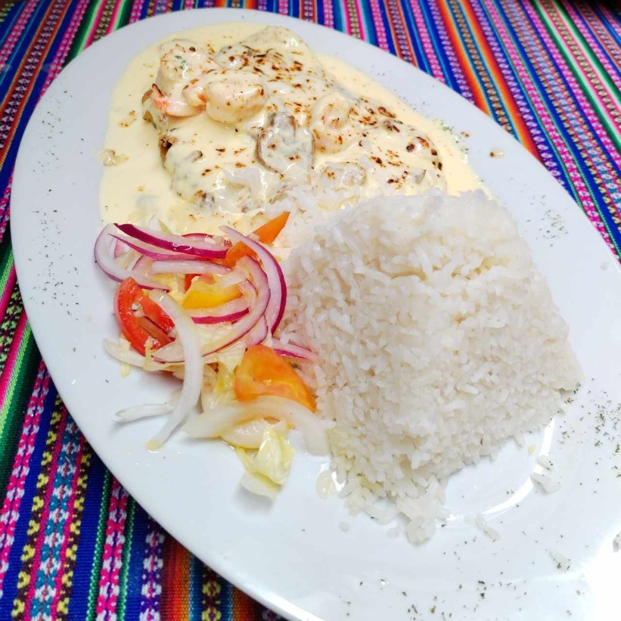 Pescado en salsa bechamel