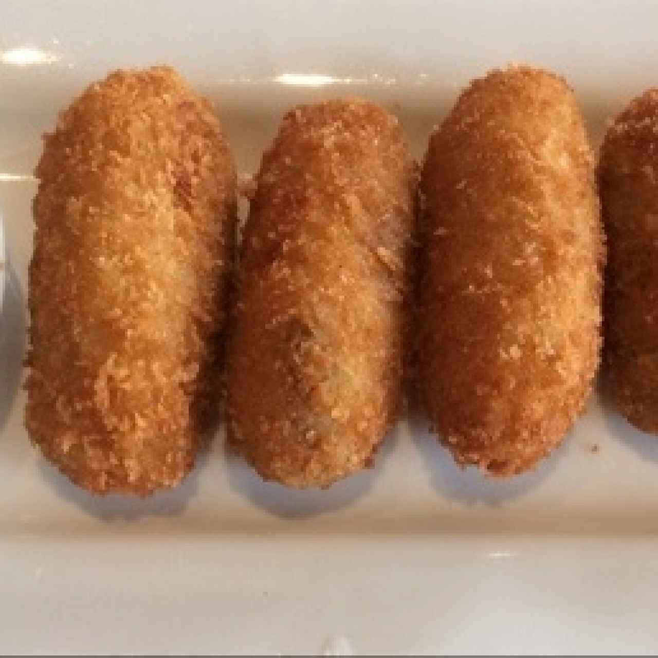 Entradas Calientes - Croqueta de Salmón