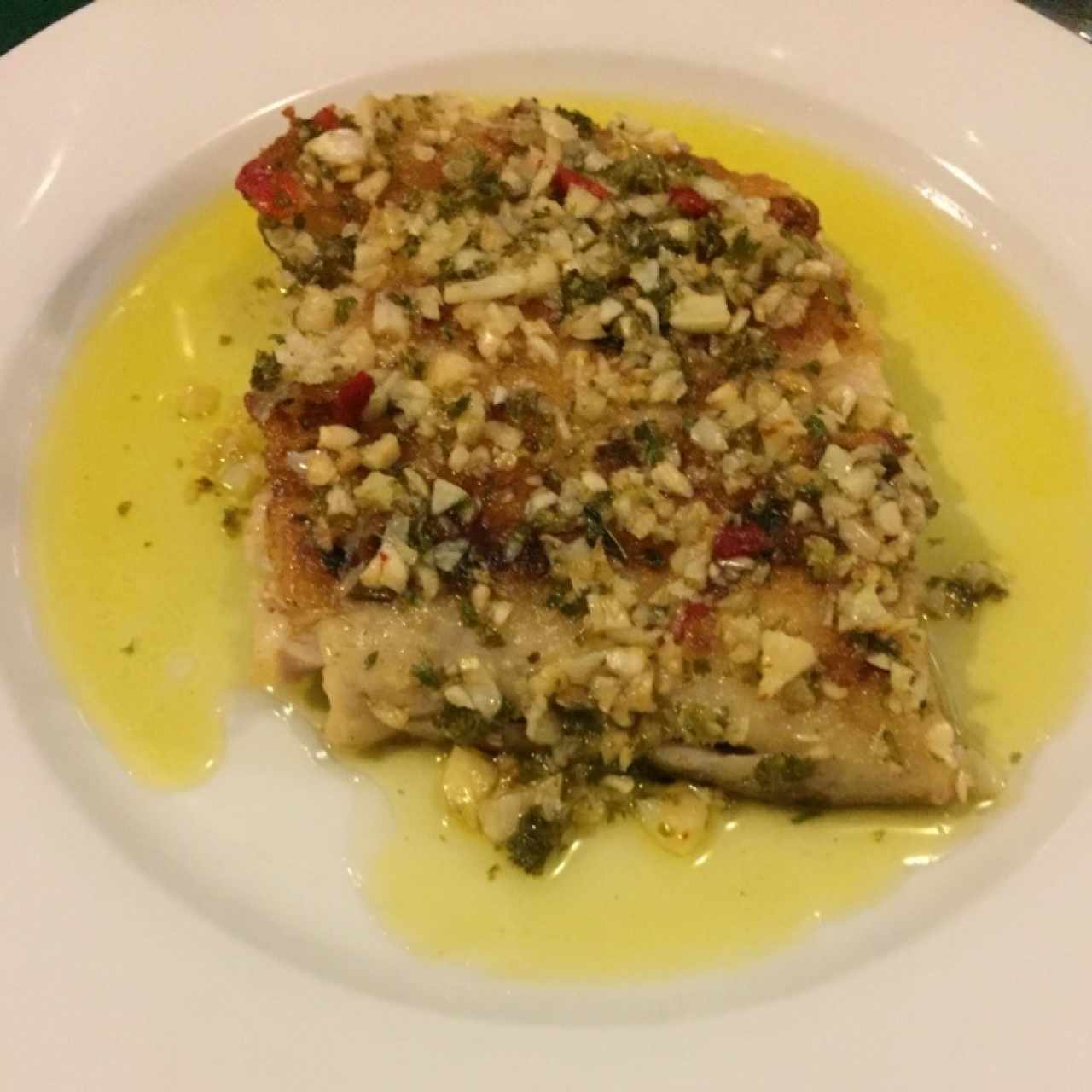 Filete de Corvina al Ajillo