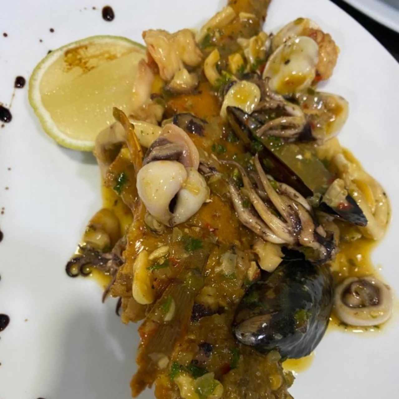 corvina con mariscos