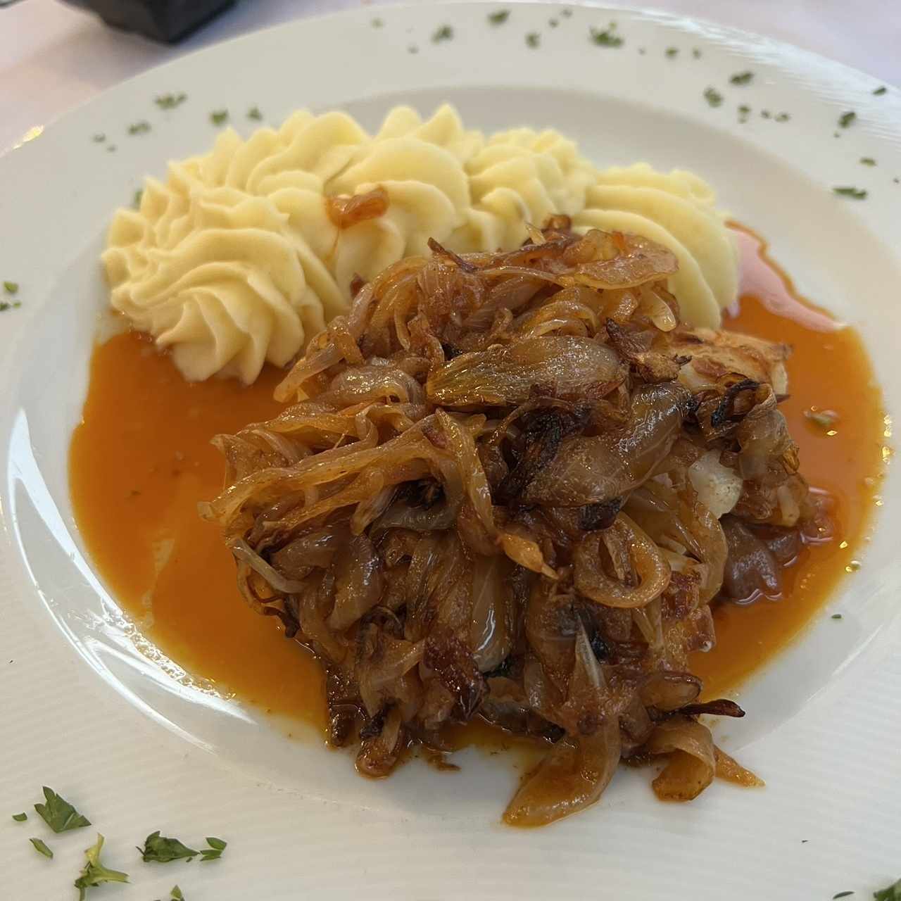 Bacalao con cebollas gratinadas