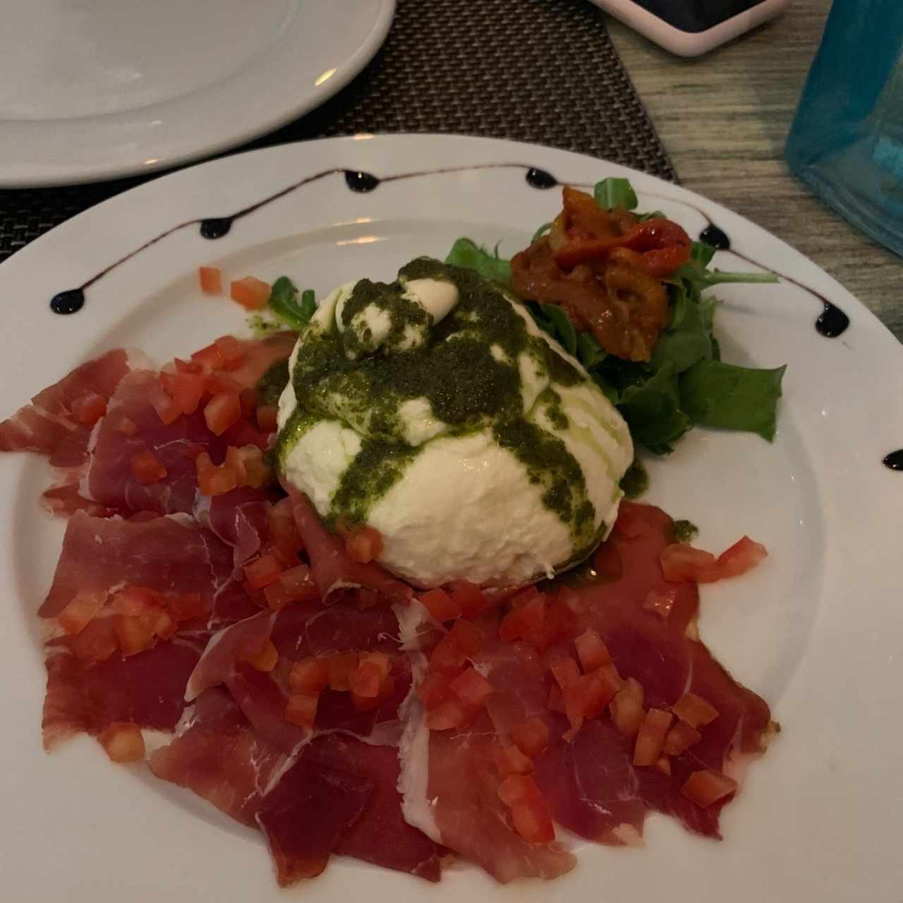 Burrata con prosciutto