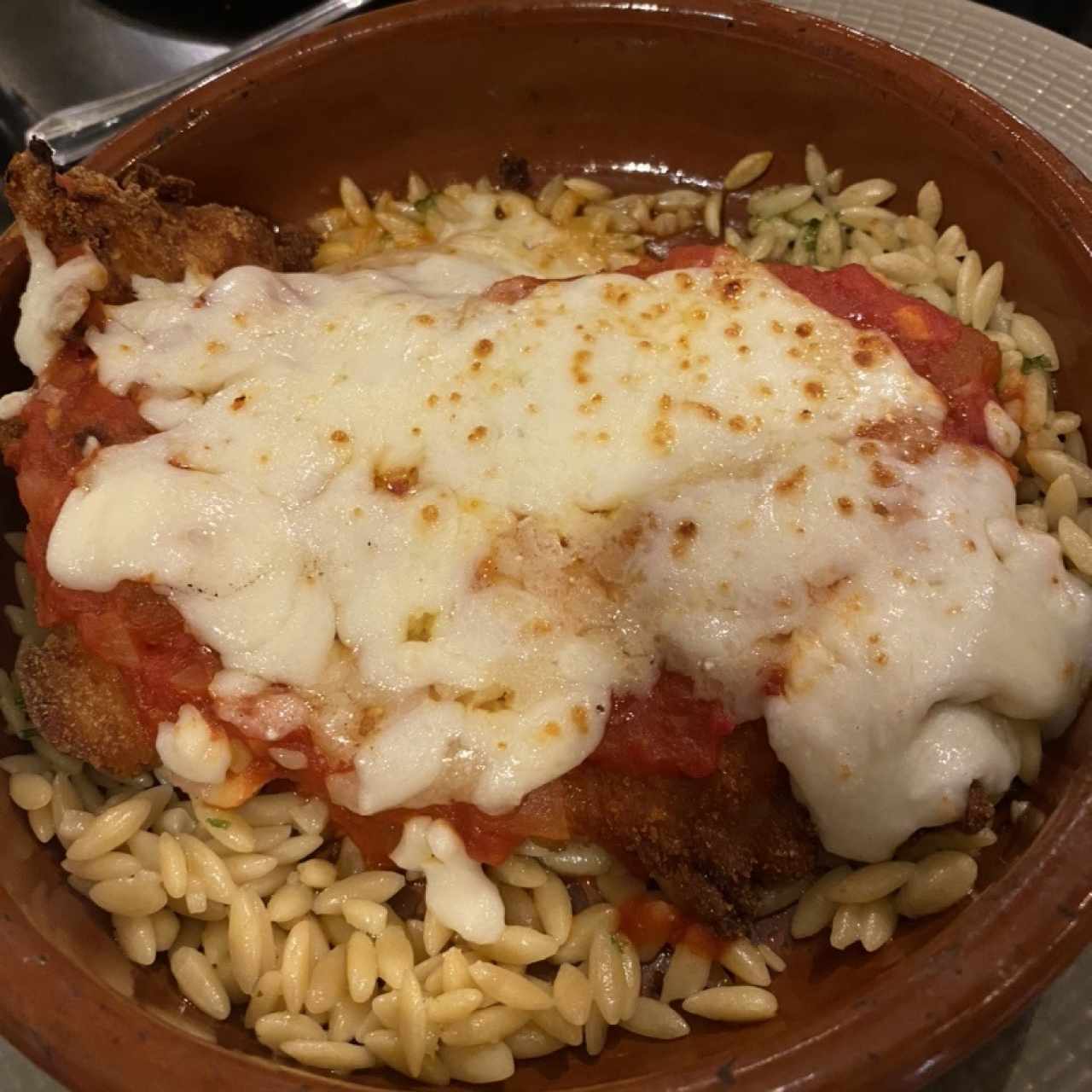 Milanesa de Pollo a la parmigiana