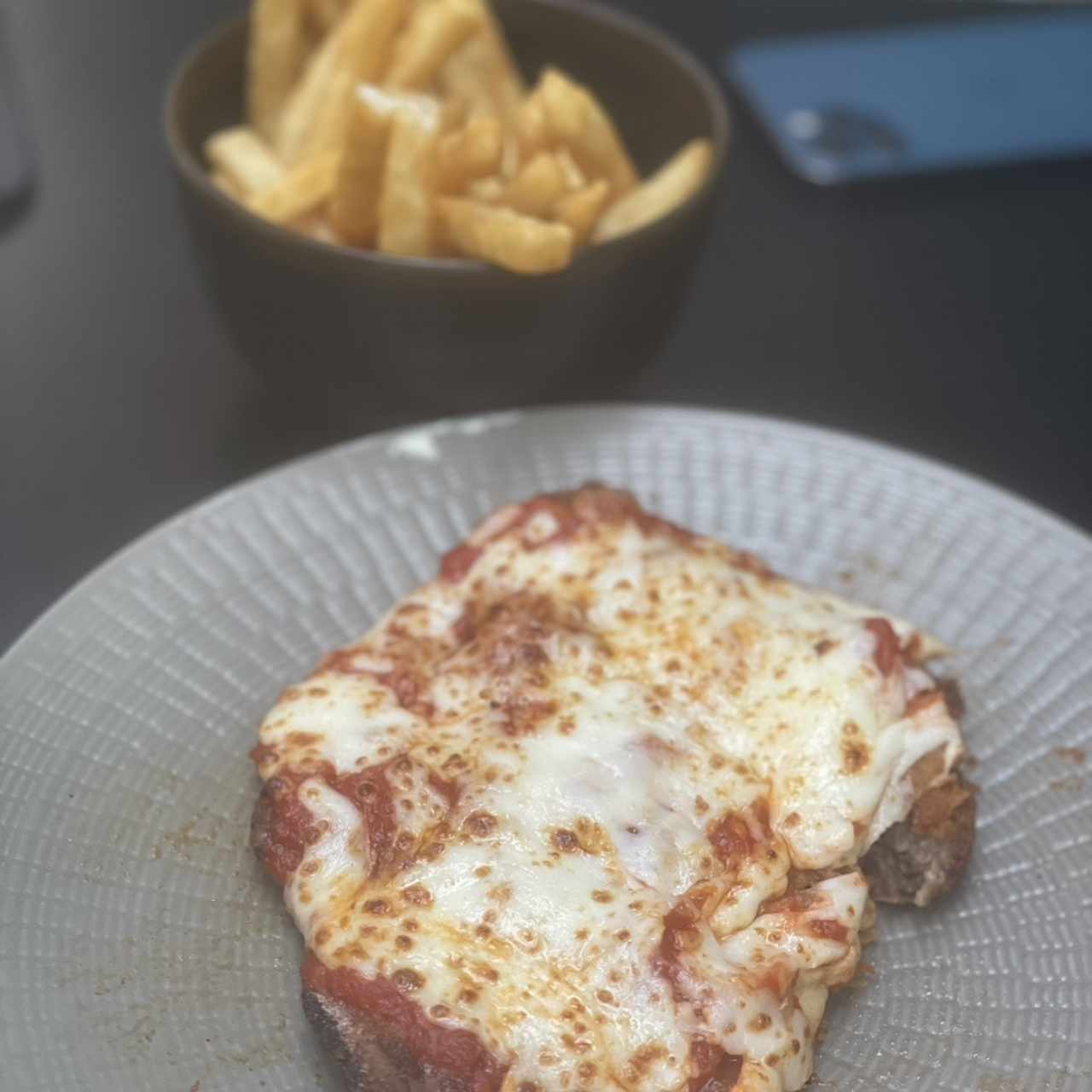 Milanesa de res parmesano