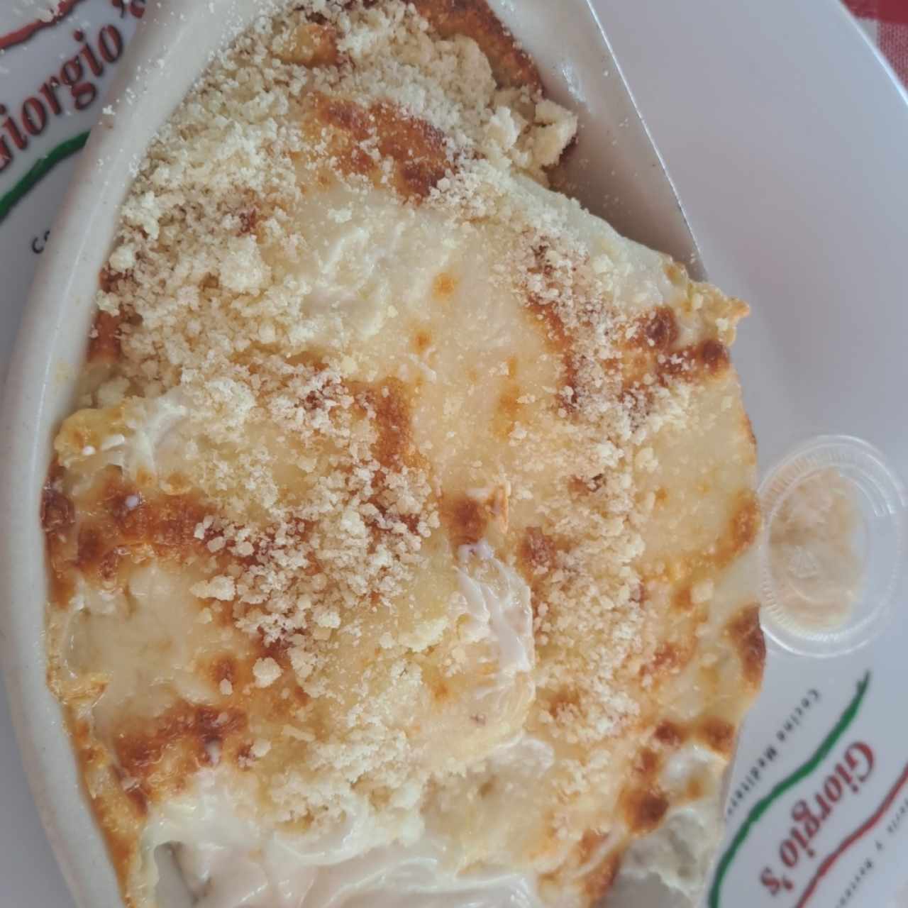 raviolis de queso gratinados