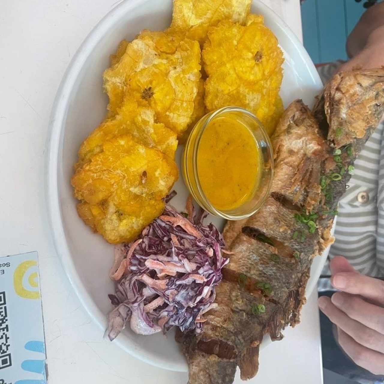 WHOLE FRIED FISH (1 pound whole fried fish of the day with sides and a selection of sauces) with Patacones