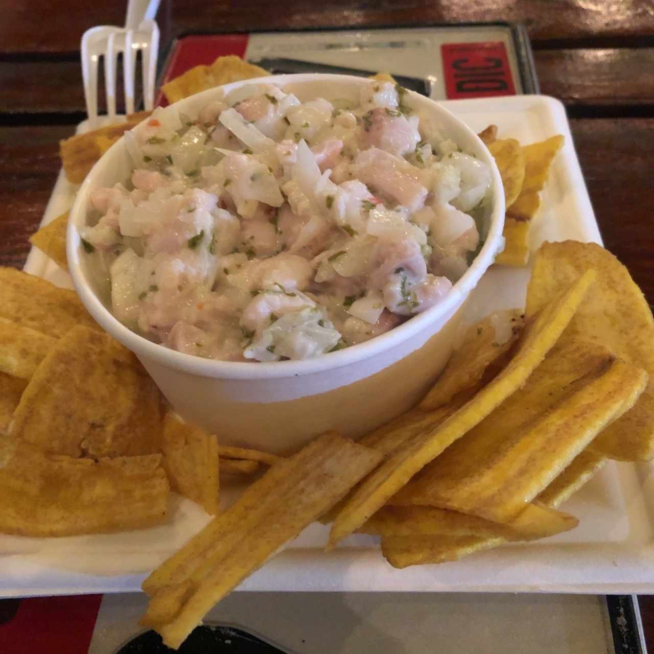 ceviche de corvina en salsa chimichurri