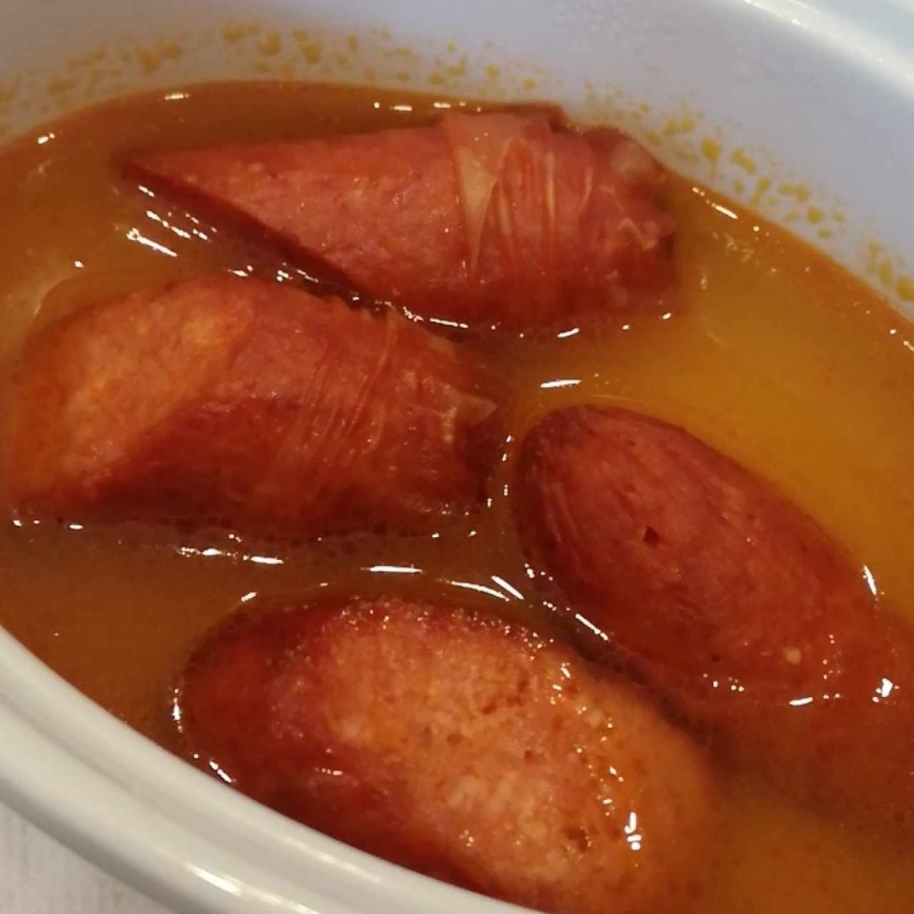 Chorizos en reducción de sidra