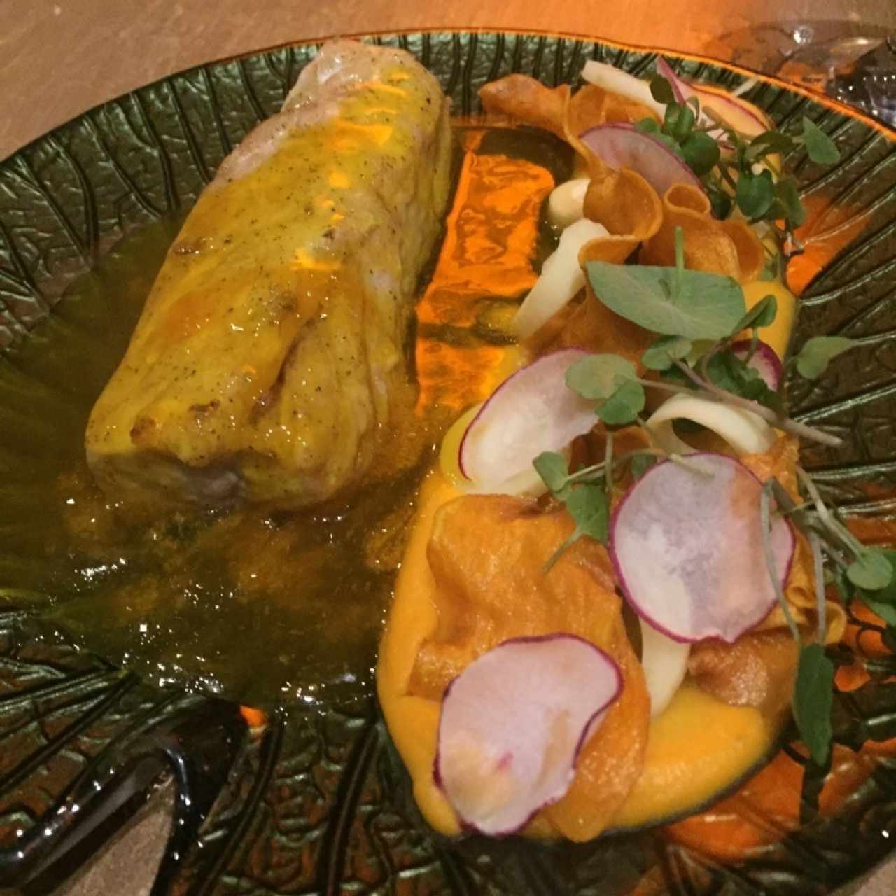 Corvina en salsa de azafrán, palmito y camote