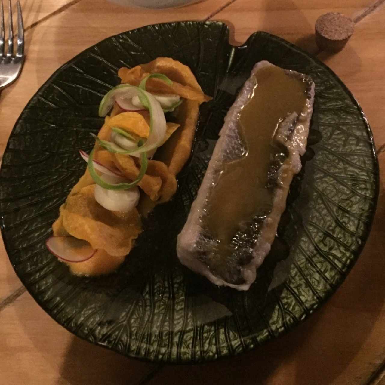 Corvina en salsa de azafrán, palmito y camote