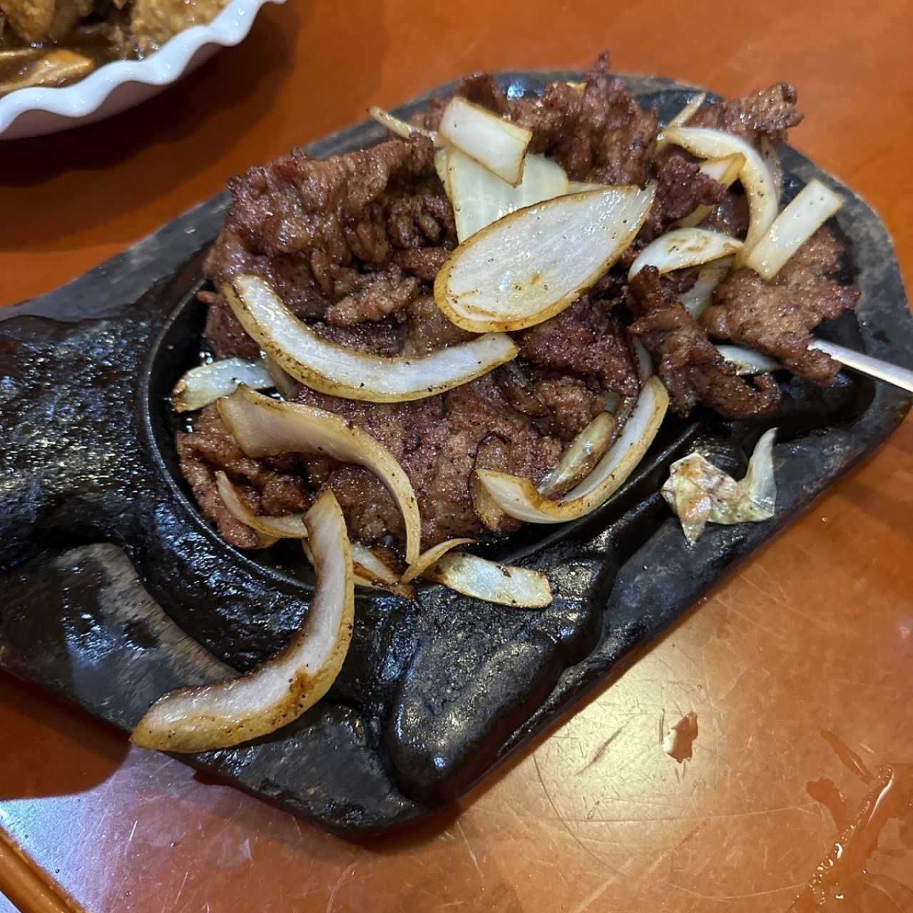 Carne de Res con jengibre y cebollina