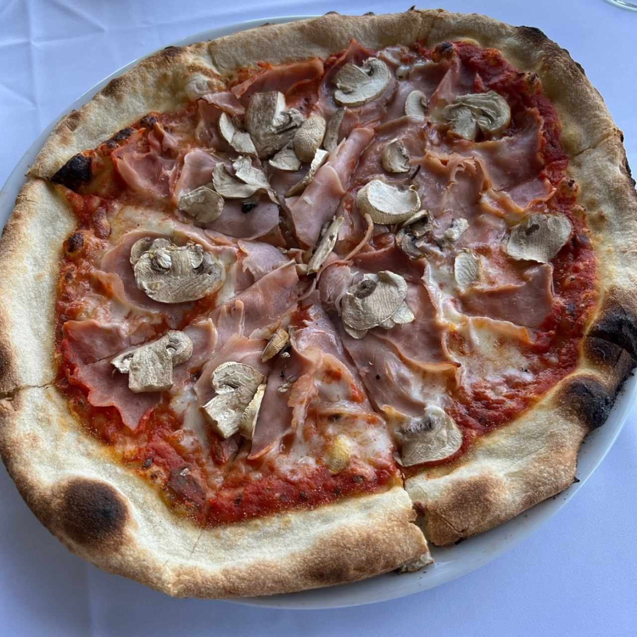 Pizza prosciutto e funghi