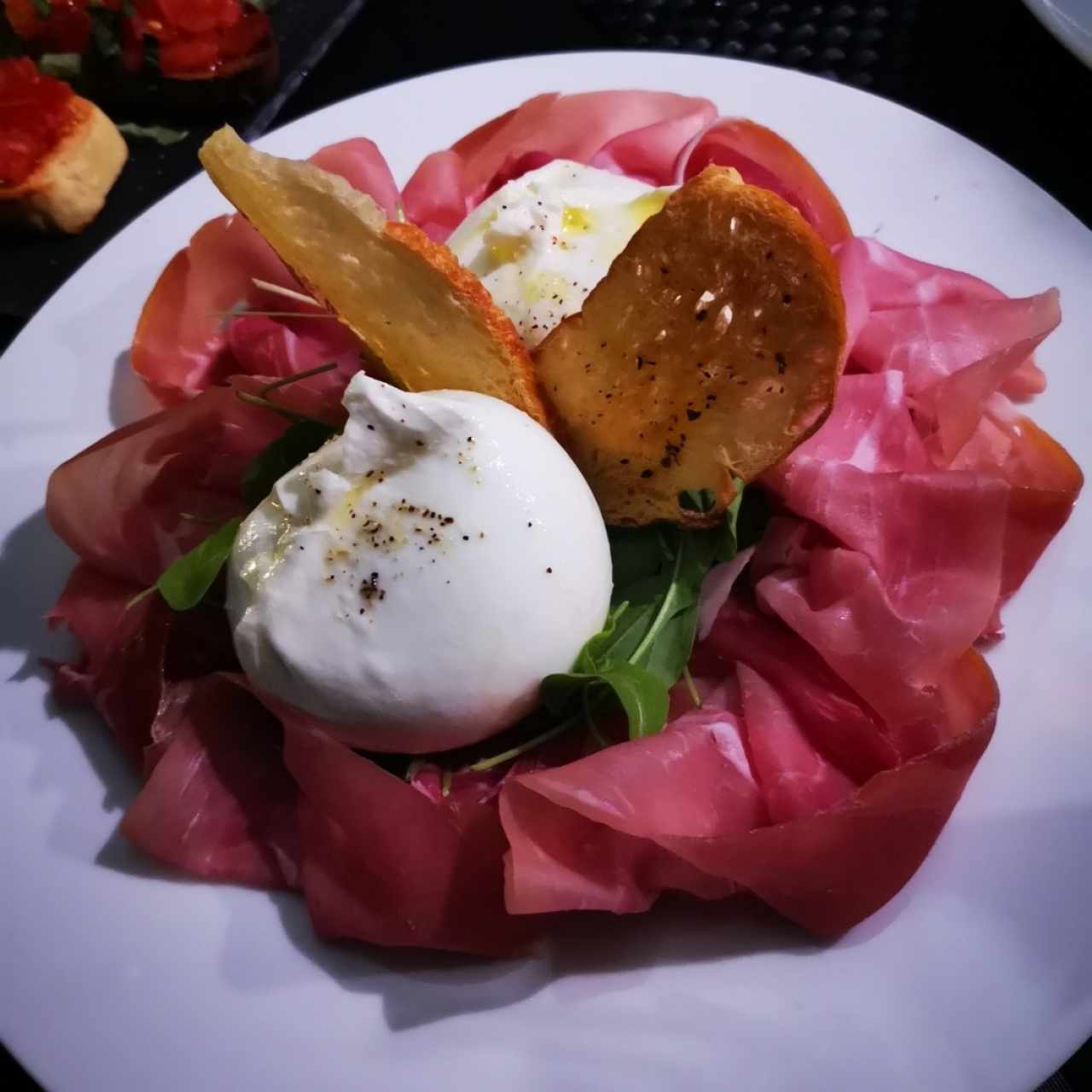 Burrata con prosciutto