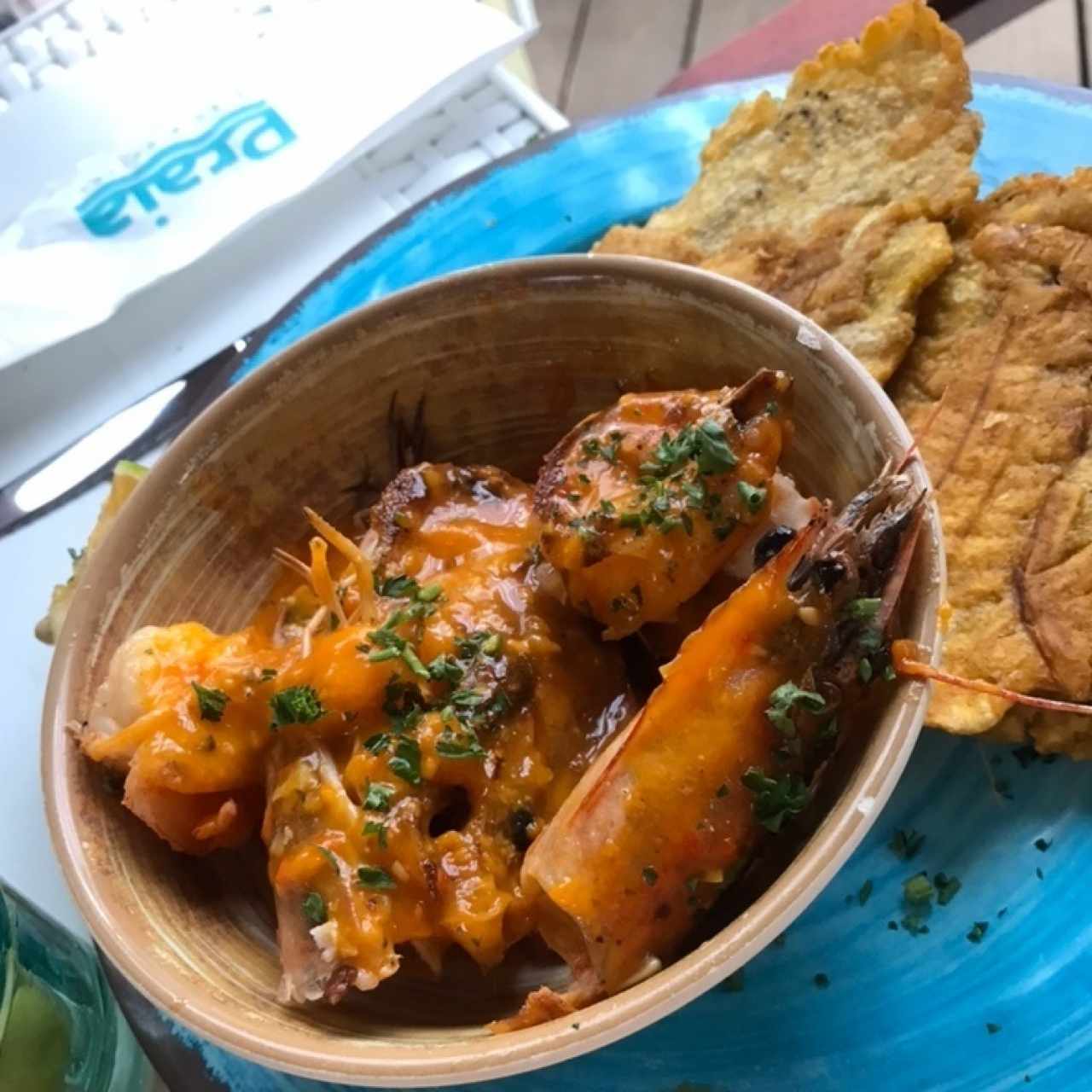 Langostinos al Ajillo con Patacones 