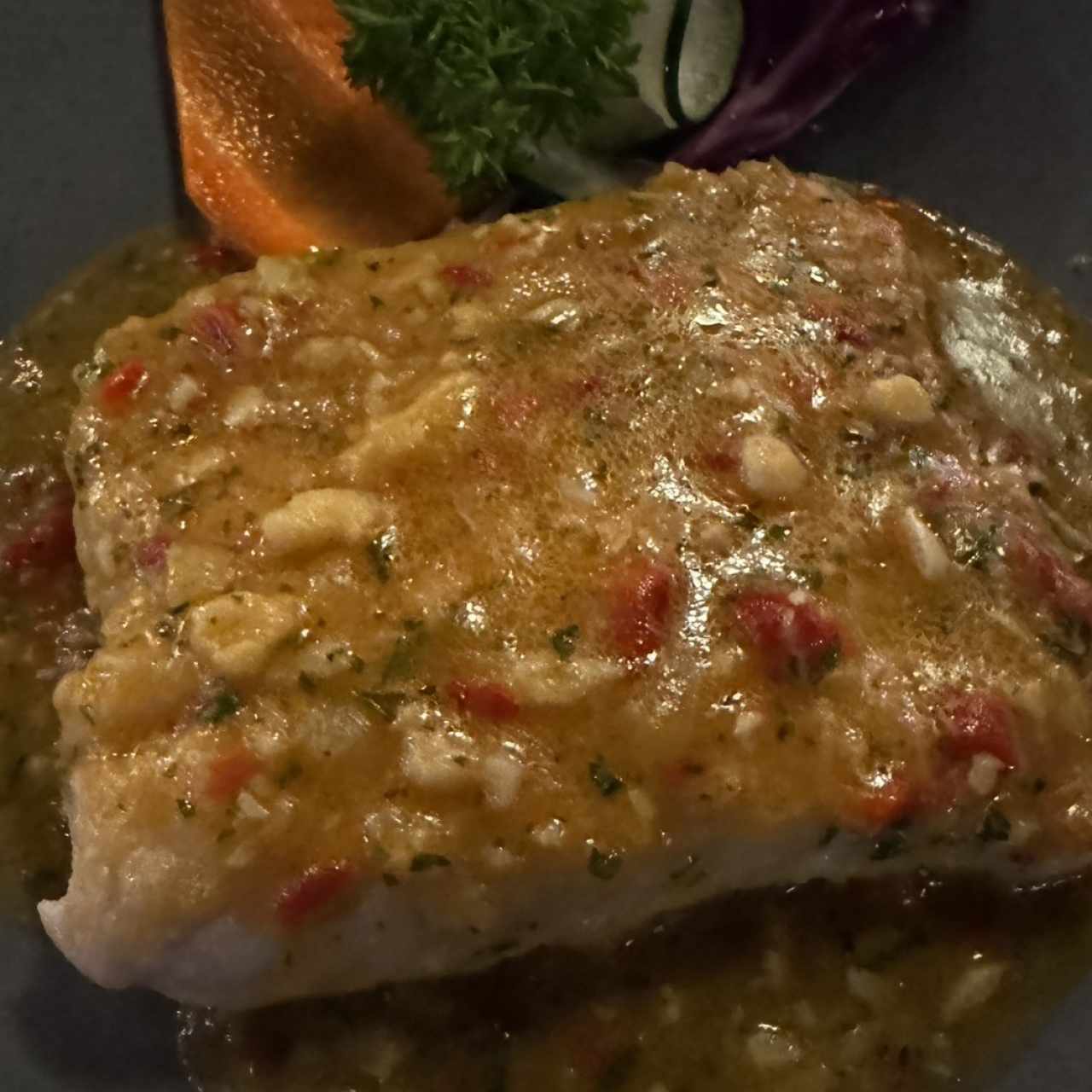 Filete de corvina al ajillo