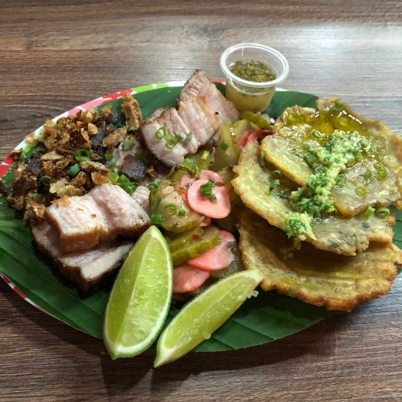 Chicharrón de Puerco Ahumado con Patacones al Ajillo