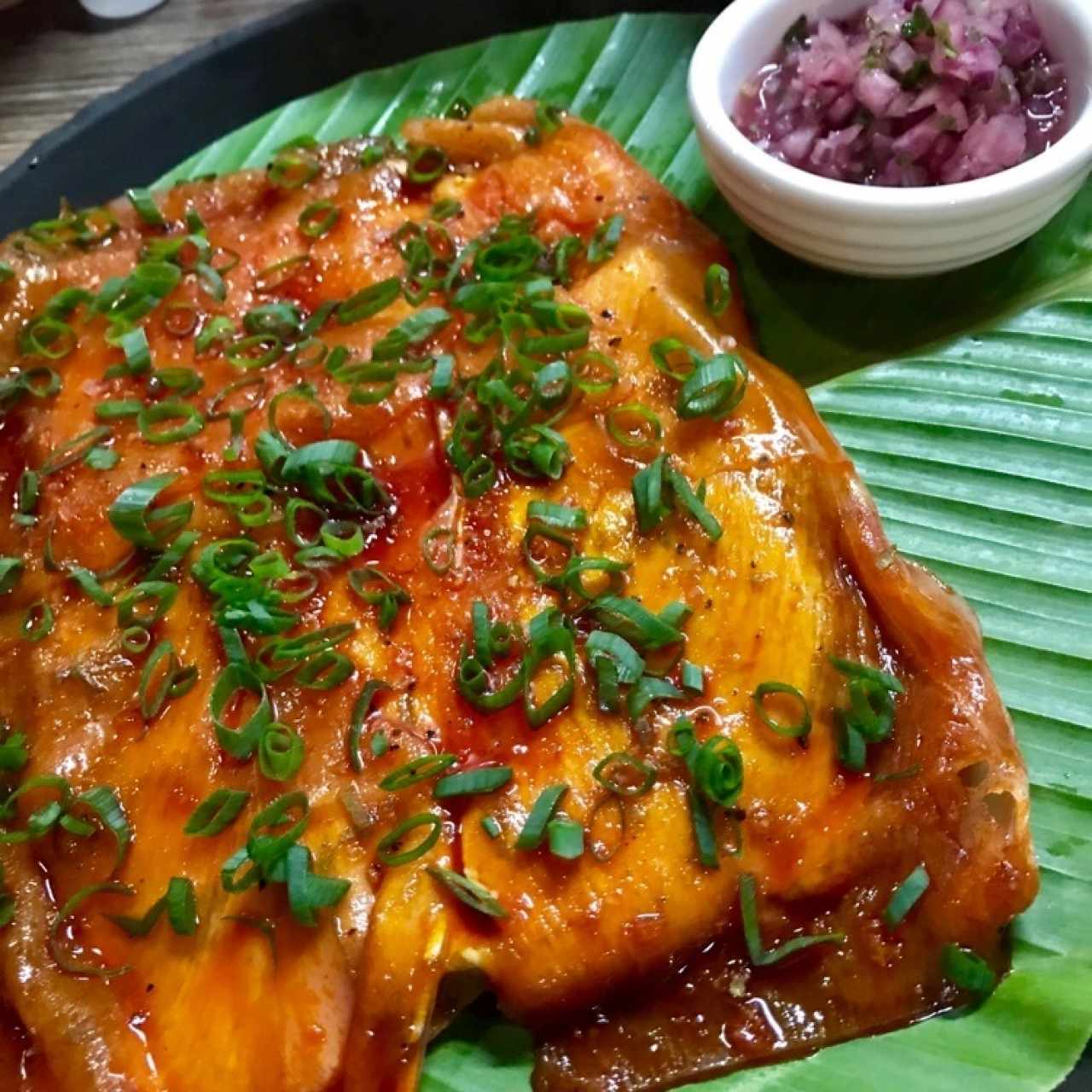 patacon with sliver of beef on top, peruvian sauce and “onion ceviche”. reccomended